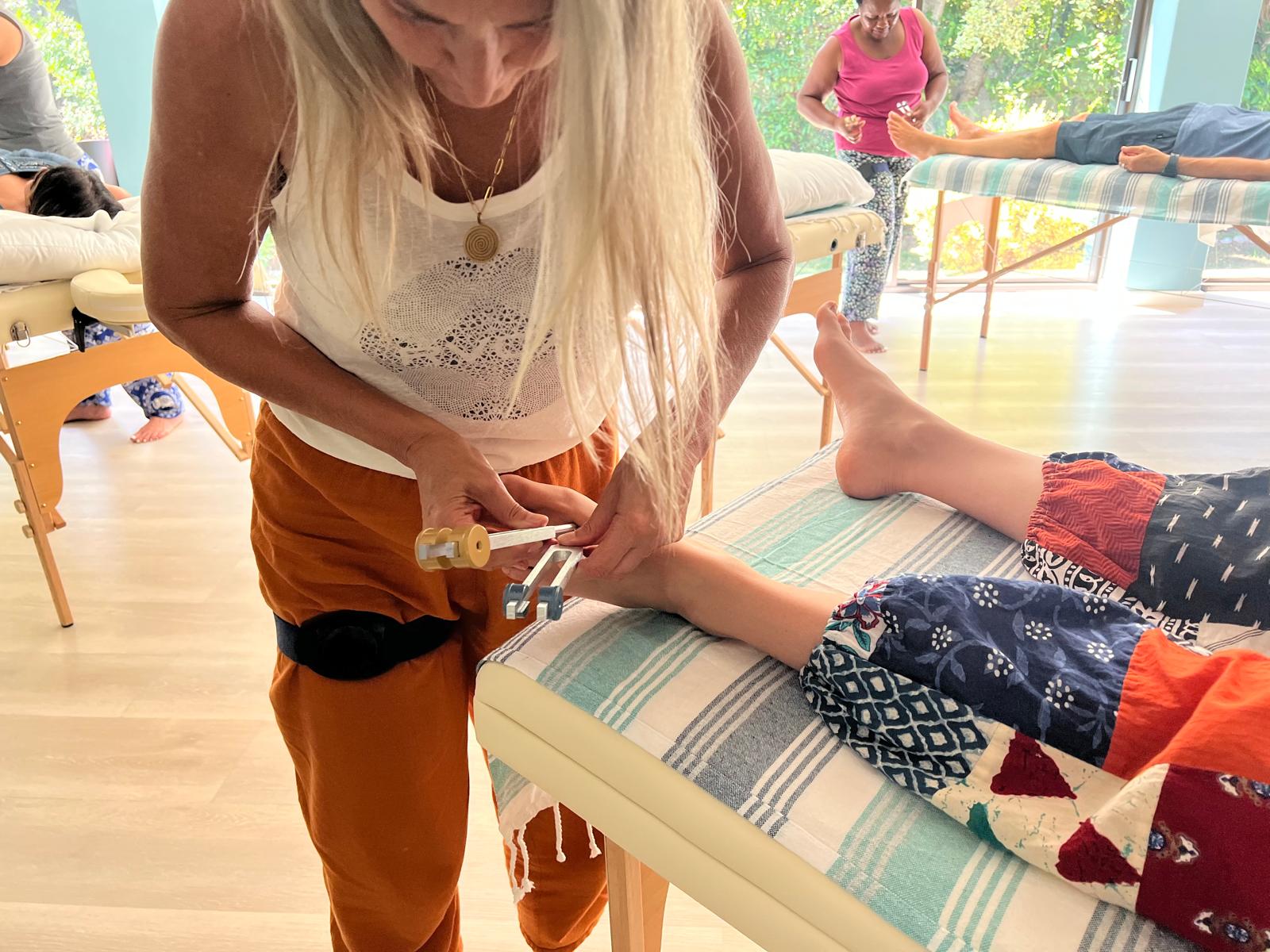 Activating a tuning fork at the foot